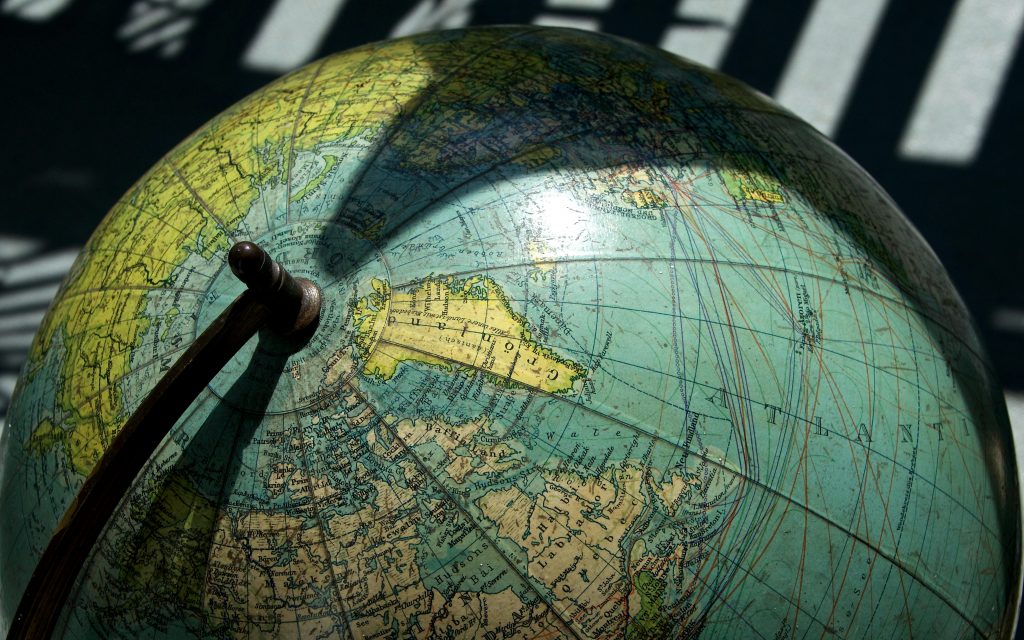 pexels photo 209154 209154 A detailed vintage globe showcasing northern regions with visible longitude and latitude lines.